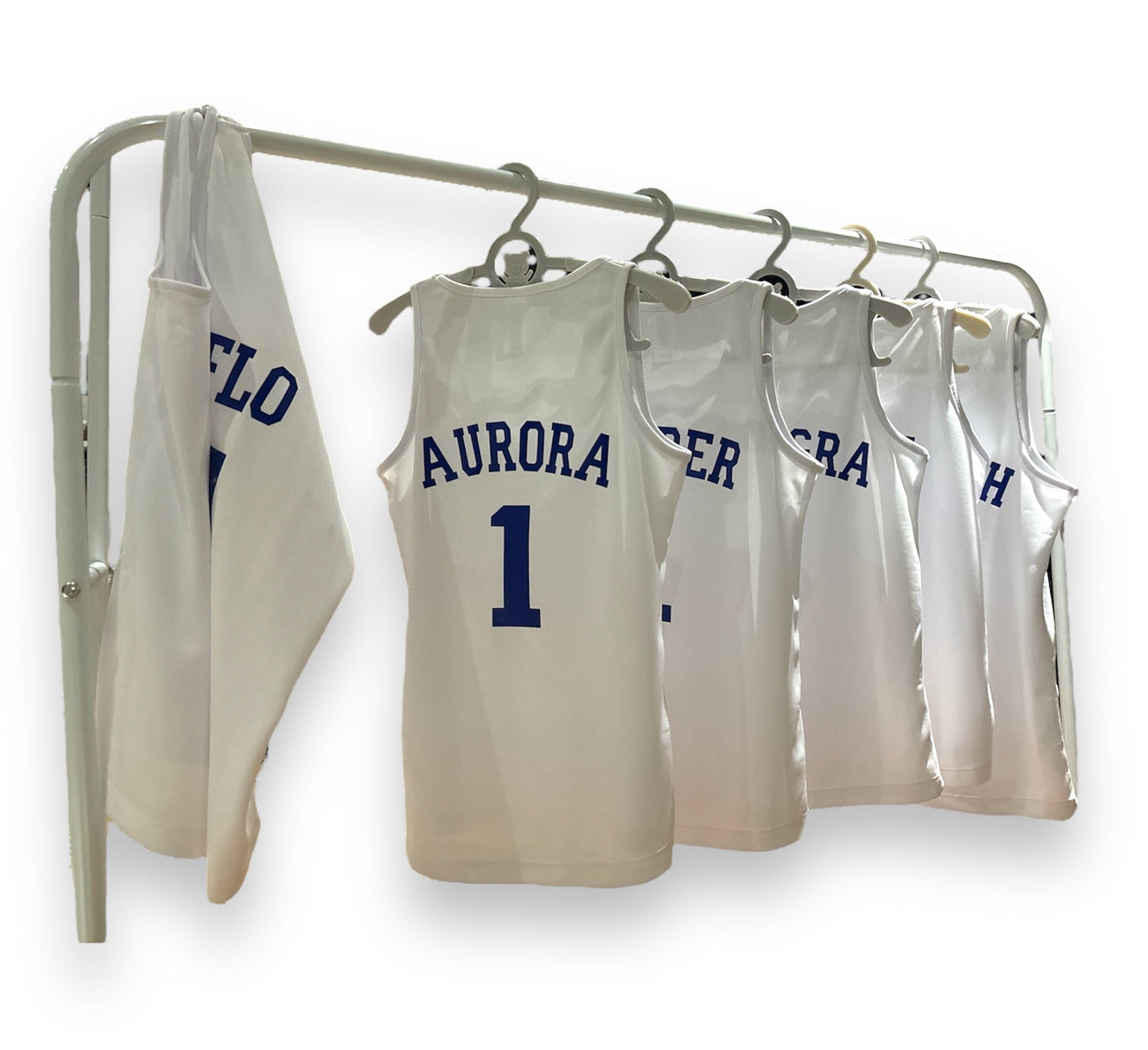 Vintage basketball jerseys hanging on a rack with 'Aurora' and number '1' visible.