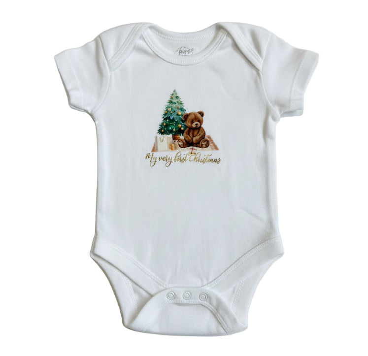 White baby onesie with a Christmas design featuring a bear and tree, on a white background.