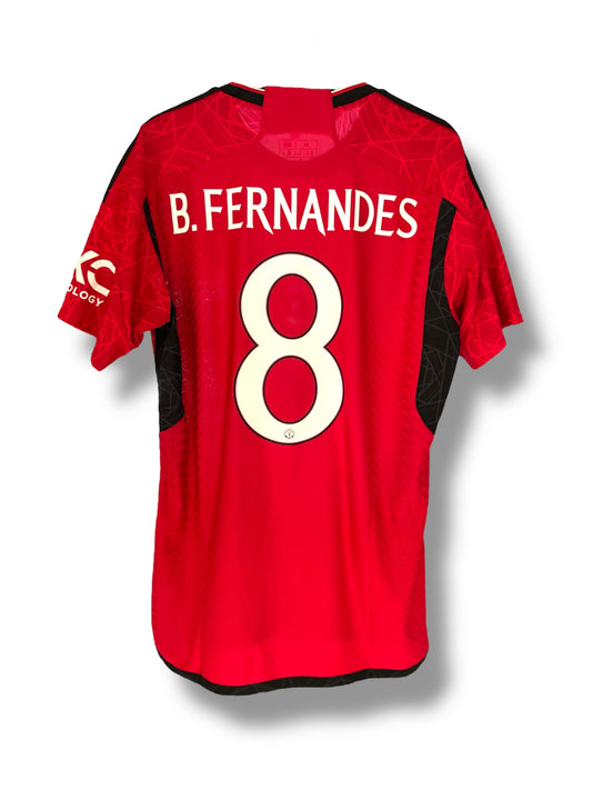 Heat pressing custom name and number onto a football shirt supplied by the customer — professional customisation by The Custom Company UK.