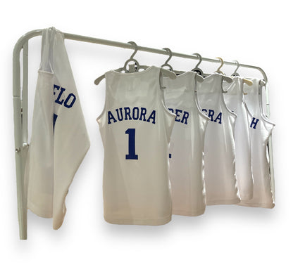 Vintage basketball jerseys hanging on a rack with 'Aurora' and number '1' visible.