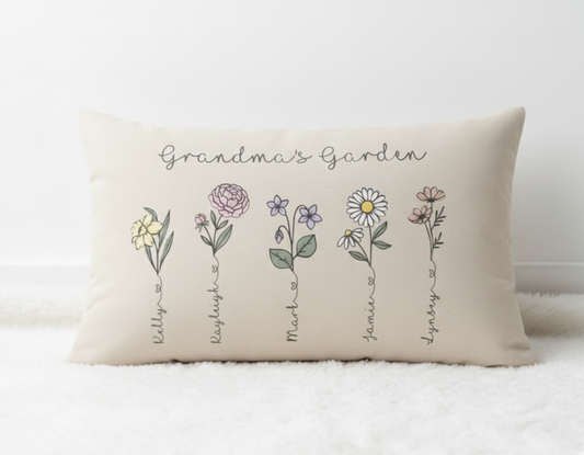 Decorative pillow with floral illustrations and text on a white background