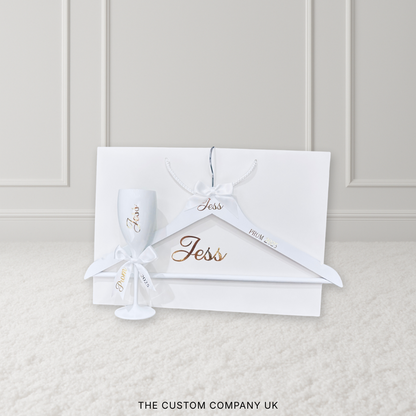 White hanger with 'Jess' branding on a light gray background