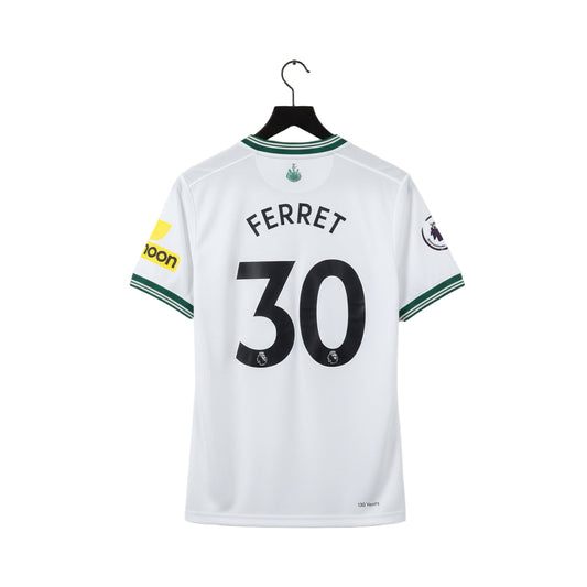 Heat pressing custom name and number onto a football shirt supplied by the customer — professional customisation by The Custom Company UK.