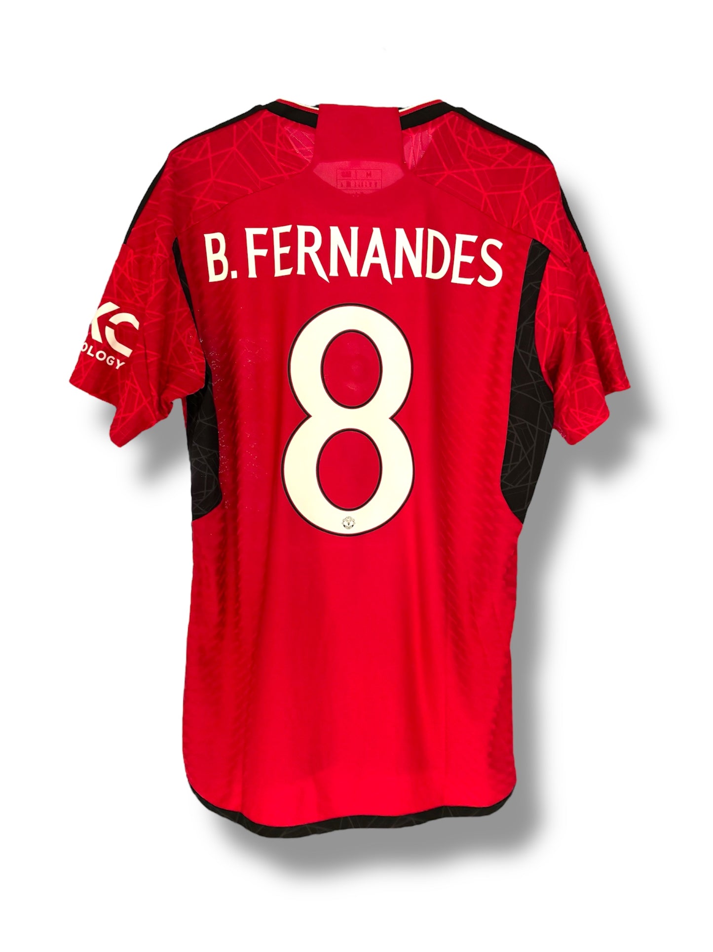 Heat pressing custom name and number onto a football shirt supplied by the customer — professional customisation by The Custom Company UK.