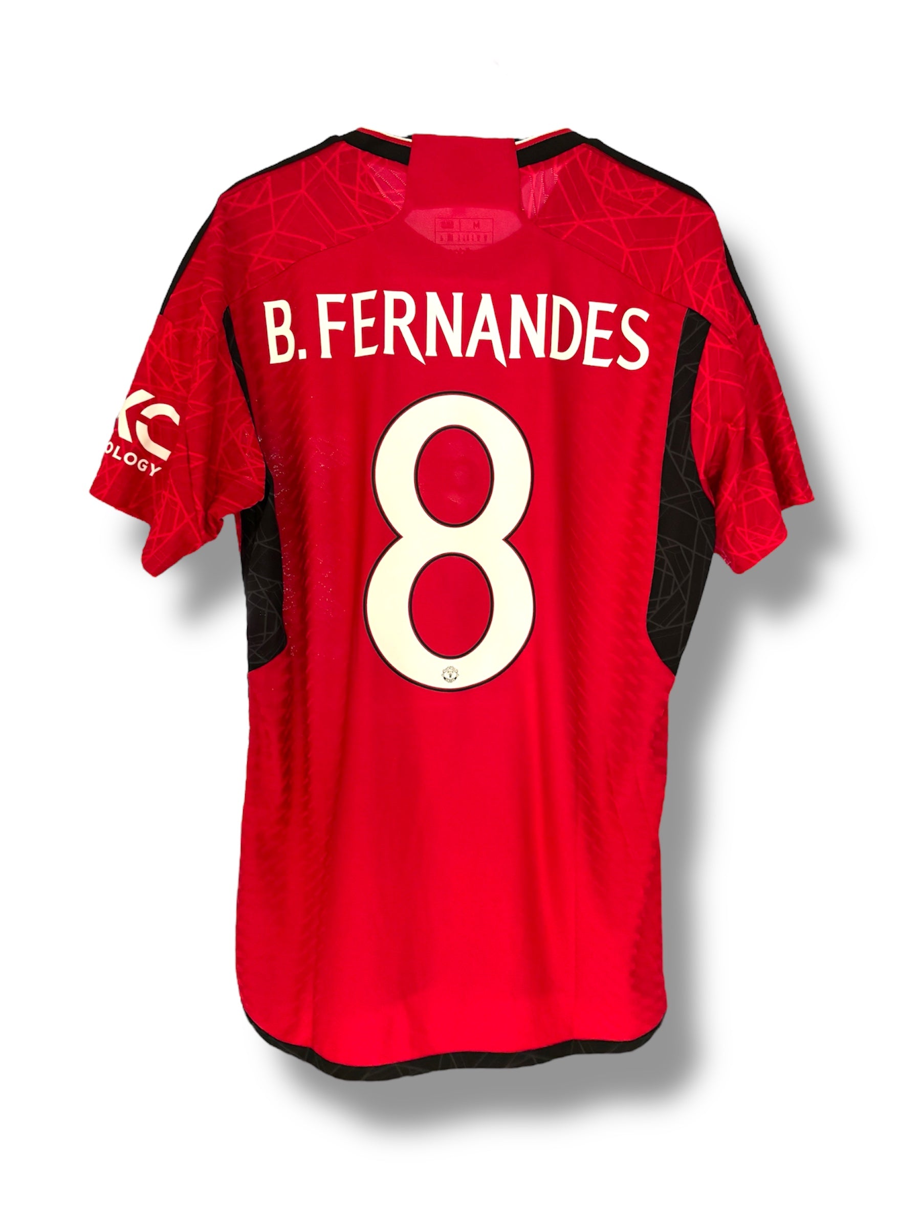 Heat pressing custom name and number onto a football shirt supplied by the customer — professional customisation by The Custom Company UK.