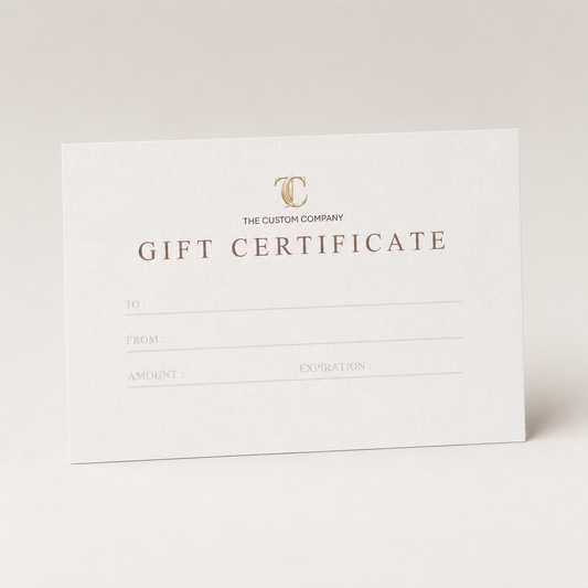 The Custom Company digital gift card featuring a luxury neutral design with gold TC monogram and personalised gift certificate details