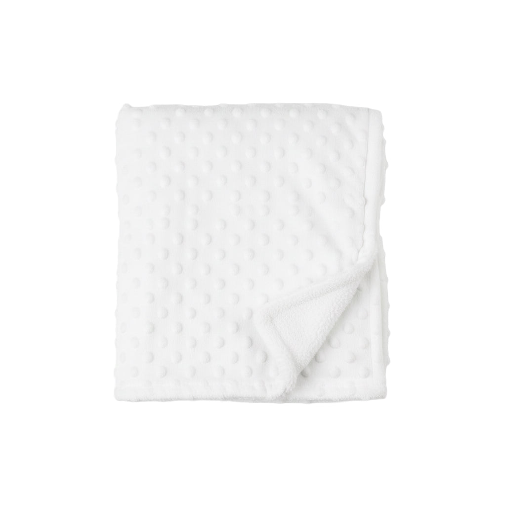 White blanket on a white background