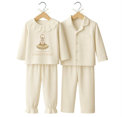Children's cream pajama set with a Christmas design on a white background