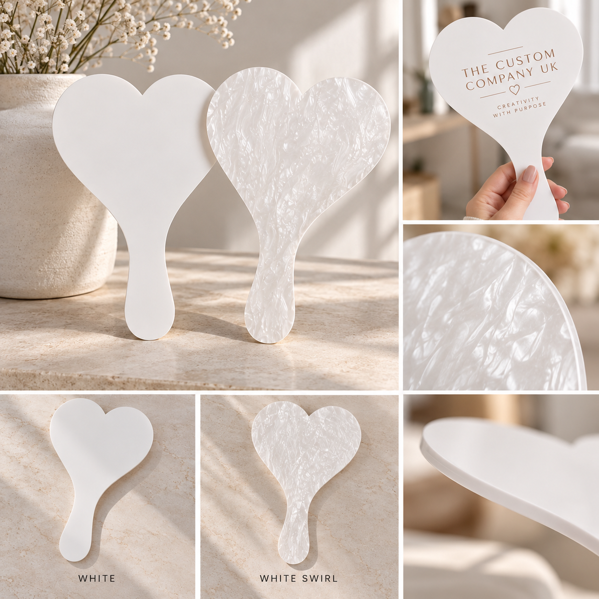 White and white swirl heart shaped acrylic photo paddles displayed against a soft pink background with white flowers, available for custom business branding.
